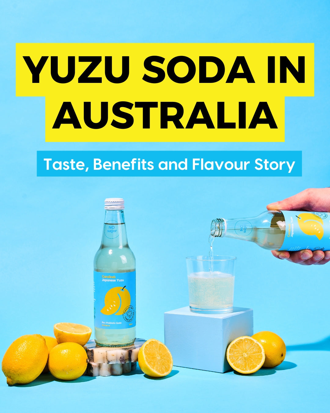 Bottle of Caroline’s Yuzu Pre + Probiotic Soda surrounded by sliced yuzu fruit and bubbles, representing a gut-friendly citrus soda made in Australia.